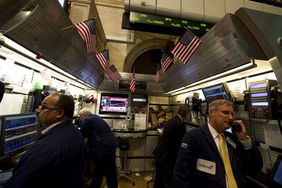Des courtiers sur le plancher de la Bourse de New York.